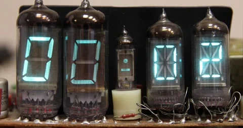 An old electronic lamp clock counts down the time on the dial. Stock Footage 196190697