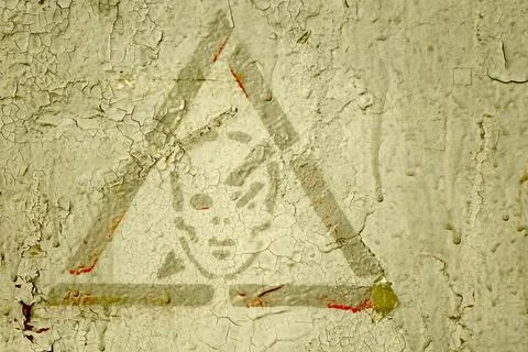 Old Electronic Security Sign Painted on a Cracked Wall in an Abandoned Buildi Stock Photos
