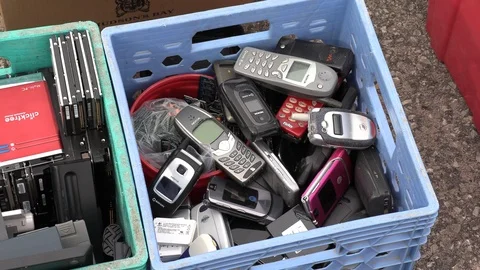 Old electronics waste for recycling at garbage dump Video stock 123934115
