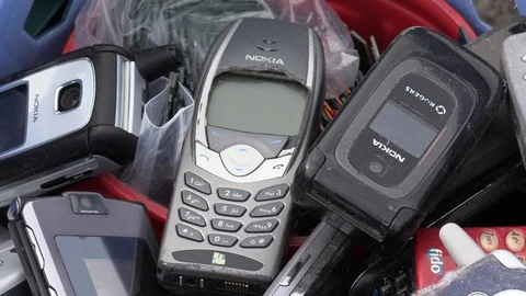 Old electronics waste for recycling at garbage dump Video stock 123935010