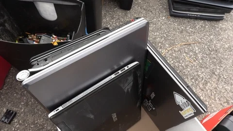 Old electronics waste for recycling at garbage dump Video stock 123935807