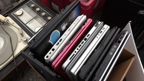 Old electronics waste for recycling at garbage dump Video stock 123935881