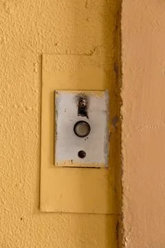Old elevator call button with grungy pattern in a soviet building in post-soviet 写真素材