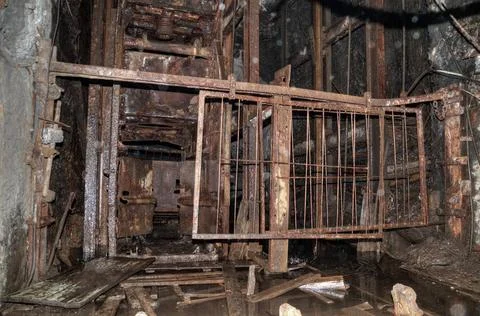 The old elevator in the coal mine Tunnel in mine, reinforced passageway in... Stock Photos