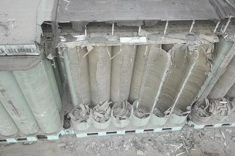 Old elevator, destruction of the old grain terminal, the demolit Stock Photos