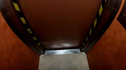 Old elevator in the hotel moves Stock Footage 99414798