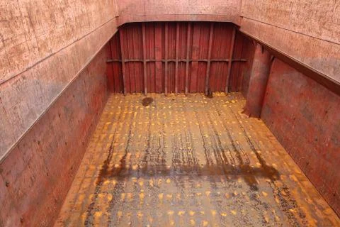 Old empty cargo hold of vessel Stock Photos