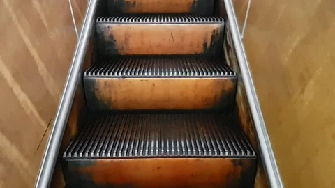 Old empty escalator moves up Stock Footage 75236369