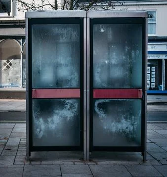 Old empty phone boxes Stock Photos