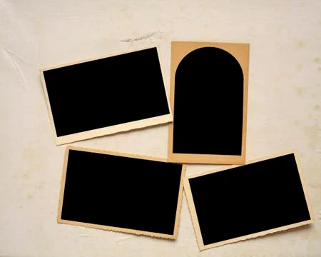 Old empty picture frames, vintage blank photo prints with free copy space Stock Photos