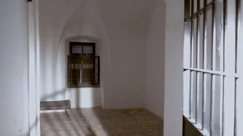 An old empty prison cell. 4K Stock Footage 325987292