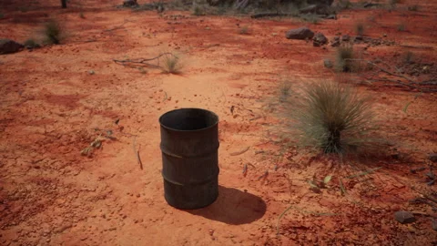 Old empty rusted barrel on sand Stock Footage 229417275