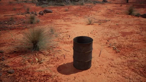 Old empty rusted barrel on sand Stock Footage 233513527