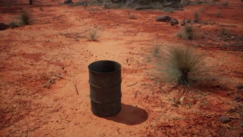 Old empty rusted barrel on sand Stock Footage 236831536