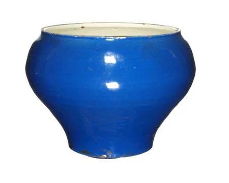 Old empty vintage iron pot covered with blue enamel isolated on white backgro Stock Photos