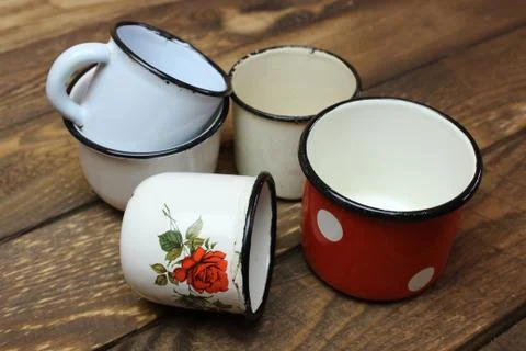 Old enamel cups Stock Photos