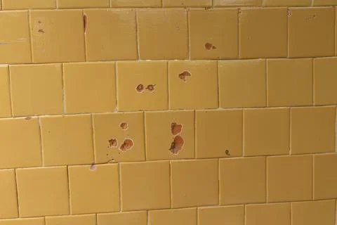 An old enamel tile wall texture. Stock Photos
