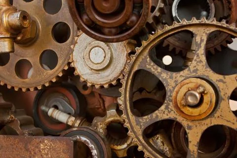 Old engine gear wheels, closeup view. Retro style. Stock Photos