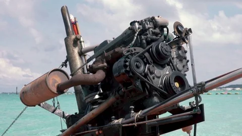 Old engine in a speed boat in south east beach Video stock 103242844