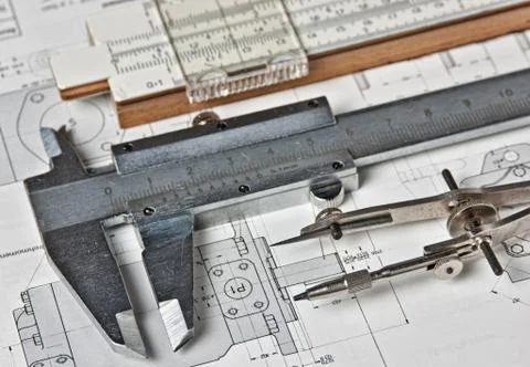 Old engineering tools on a technical drawing Foto stock
