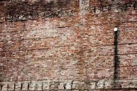 Old eroded stained brick wall Stock Photos