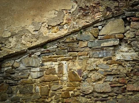 Old eroded stone wall Stock Photos