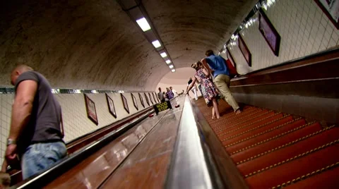 Old escalator with people. Stock Footage 8687887
