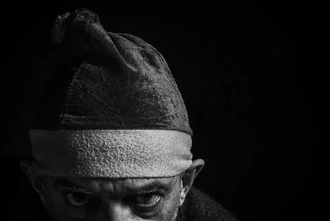 Old evil christmas elf. Stock Photos