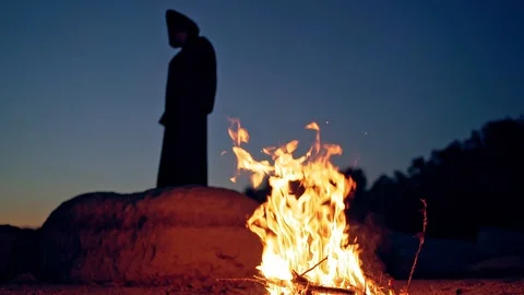 Old evil witch conjures in the wizarding lair. Scary Halloween concept. Video stock 114688145