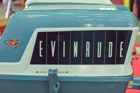Old Evinrude logo on outboard motor. Stock Photos