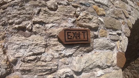 Old exit sign on the wall Stock Footage 103675717