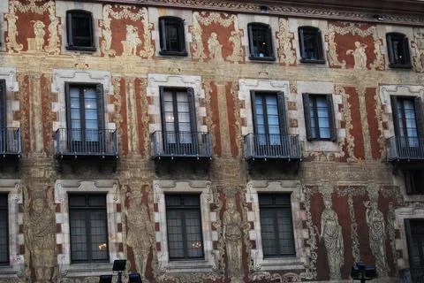 Old facade Building Windows with Balcony Barcelona Stock Photos