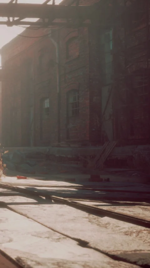Old factory building at sunset with shadows and light on the ground Stock Footage 343161933