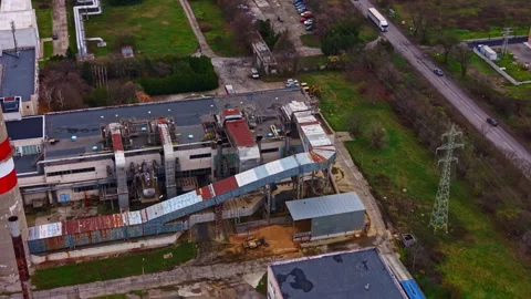 Old factory complex seen from above with surrounding area and parking lot Stock-Footage 331952459