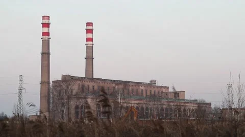 Old factory with grey sky and clouds. Industrial pollution. Stock Footage 44795683