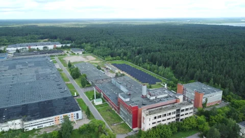 Old Factory using Solar Panels on Roof in Daugavpils Stock Footage 311937839