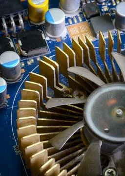 An old fan on the computer's video board Stock Photos