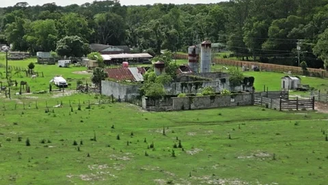 Old farm house with silos 스톡 동영상 243279448