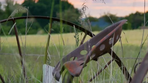 Old Farm Machine Pan Left to Right Sunset 20secs 25FPS HD P5 Stock Footage 133276787