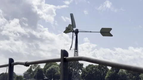 Old farm windmill rotating slow motion Stock Footage 336814083