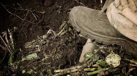 Old farmer working with the spade a small plot of land Stock Footage 62874701