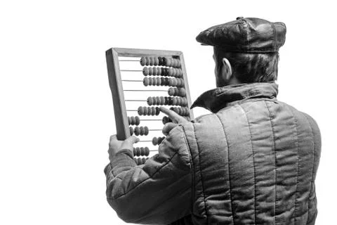 Old fashioned bearded man counts on retro abacus, studio shot, monochrome eff Fotos Stock