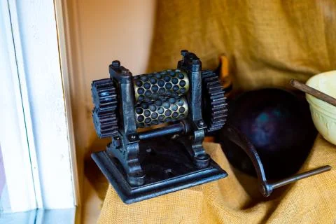 An Old Fashioned Candy Drop Roller Machine Stock Photos