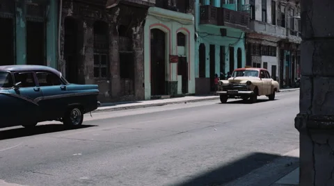 Old fashioned car moving on road Stock Footage 53751668
