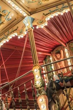 An old fashioned carousel at night Stock Photos