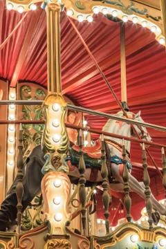 An old fashioned carousel at night Stock Photos