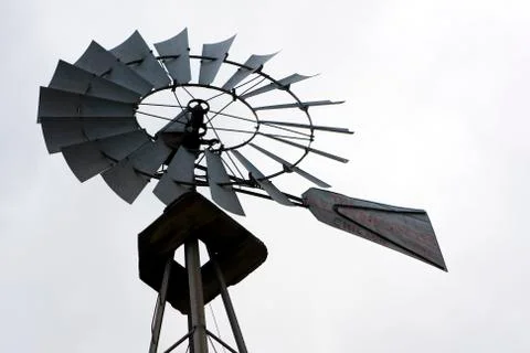 Old fashioned farm windmill Stock Photos