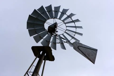 Old fashioned farm windmill Stock Photos