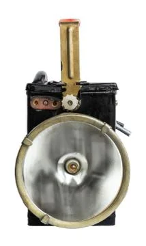 Old fashioned flashlight in off state. isolated on white background. Stock Photos