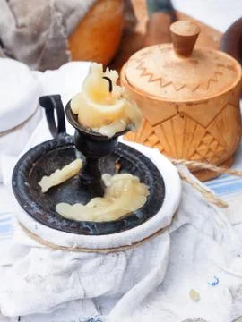Old fashioned household items, set for candle and soap making. Historical rec Stock Photos